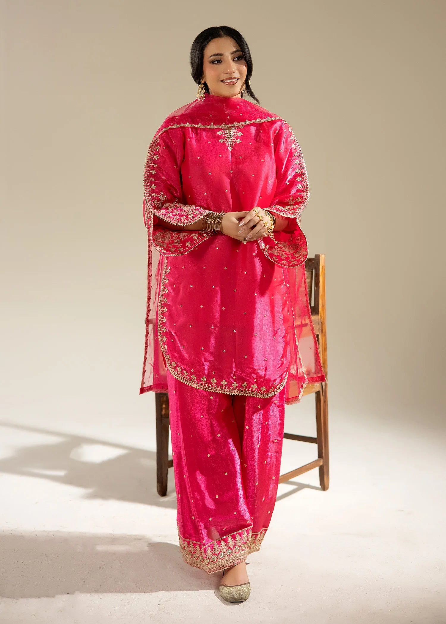 woman wearing sitara pink dress buraqstore elegant outfit