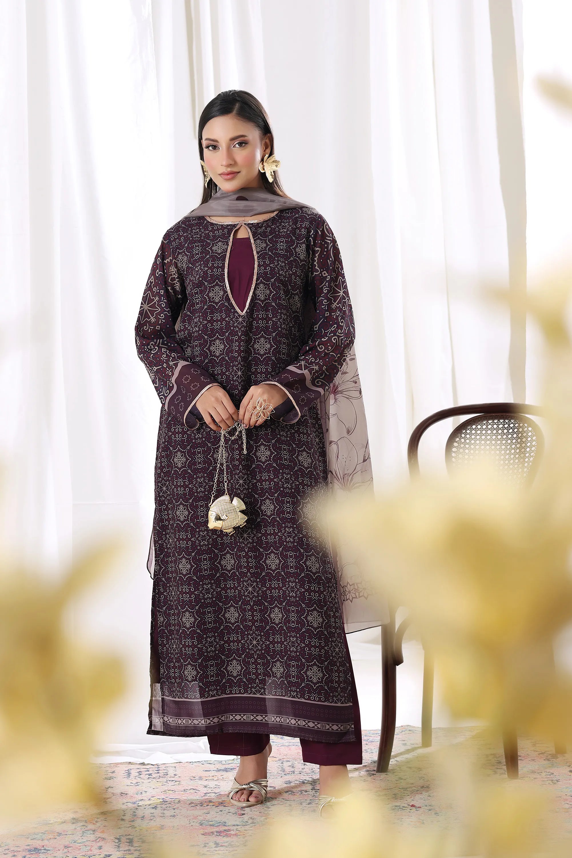 Model wearing Plum Noir chiffon pret from Buraqstore, stylish women’s dress