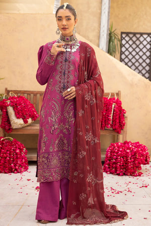 Model displaying karandi winter collection unstitched suit with heavy embroidery and cozy fabric tones from Buraqstore
