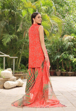 Girl wearing elegant orange color dress lawn suit by buraqstore for summer styling