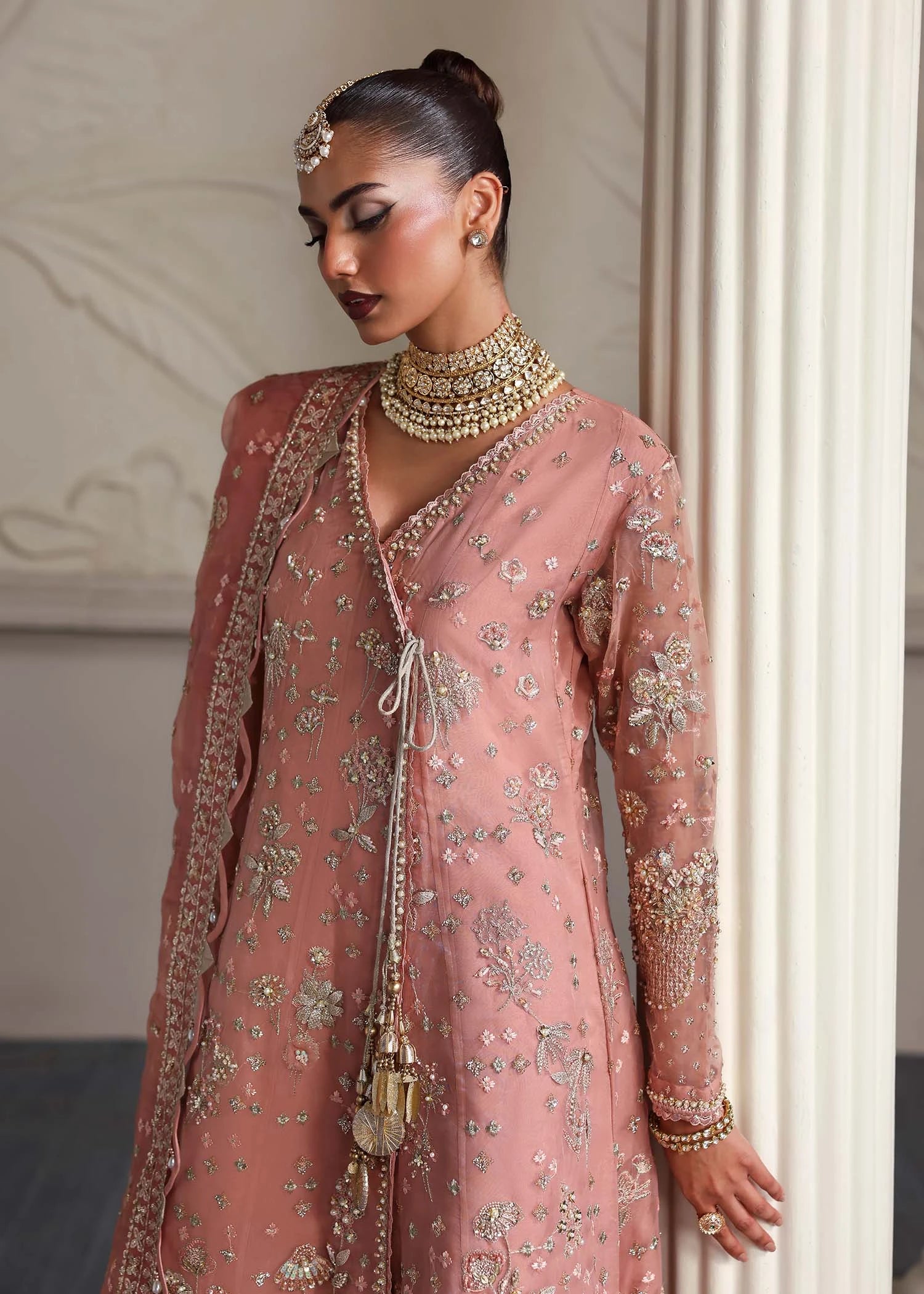woman posing in angrakha pink dress buraqstore formal wear