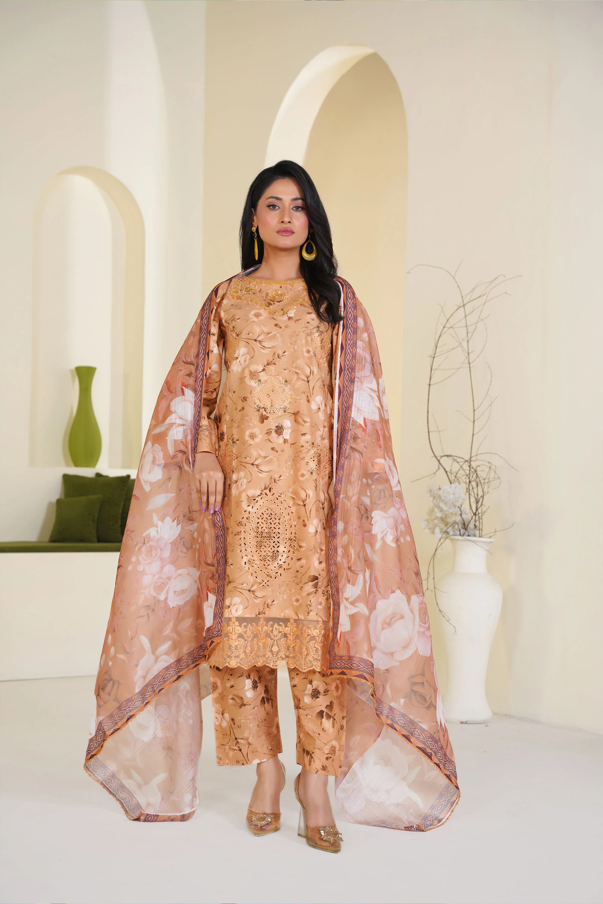 Girl wearing lawn dress by Buraqstore styled for daytime events