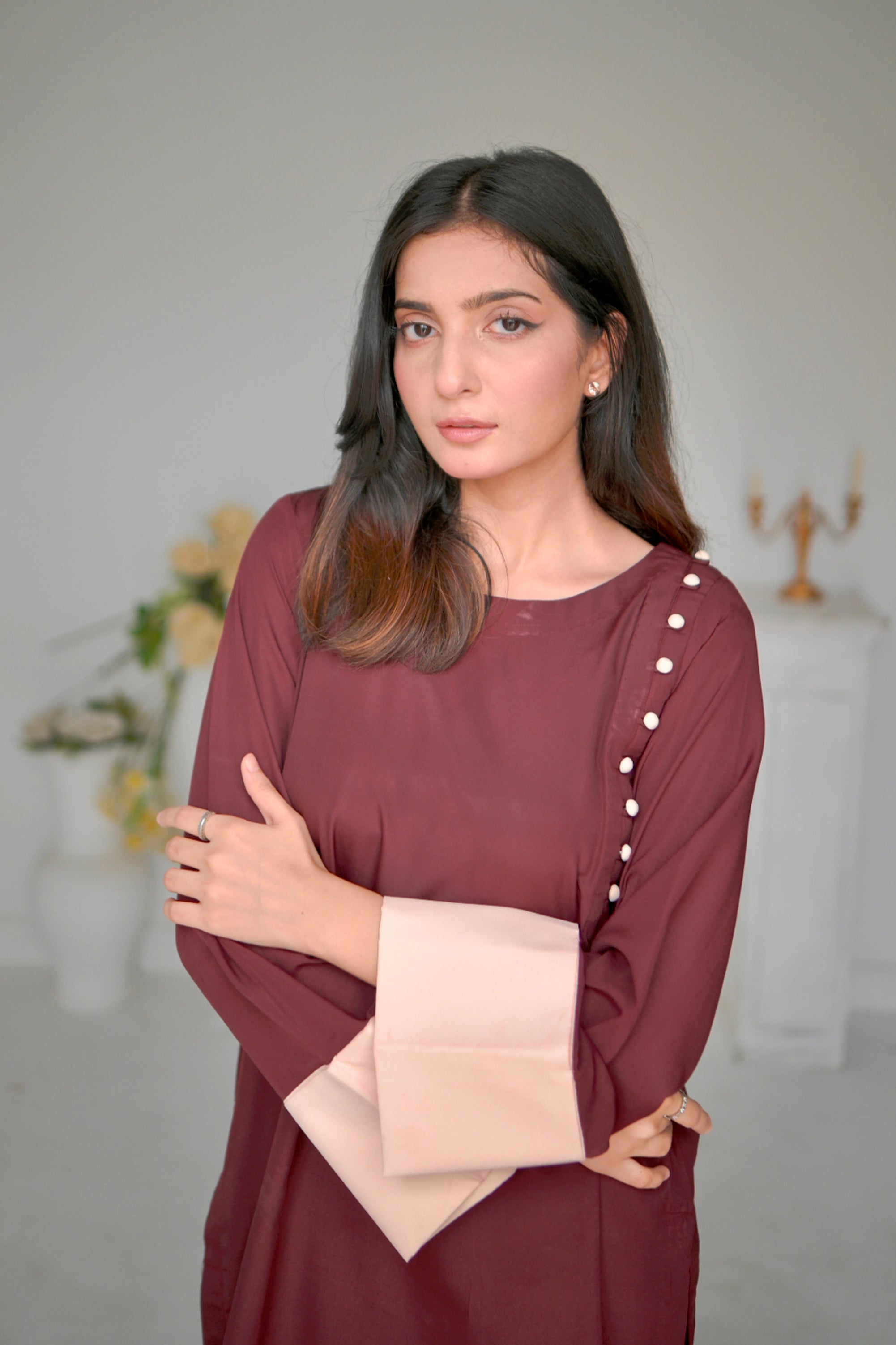 Girl wearing flowy georgette dress by Buraqstore styled for evening wear