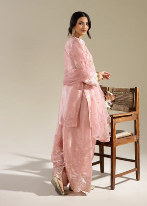 woman posing in pink formal suit buraqstore fashion outfit