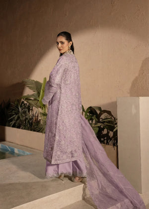 Woman wearing a lilac embellished 4 piece Manahils dress from Manahils dress online shopping, featured at Buraq Store