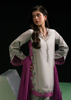 Girl wearing premium formal dress by Buraqstore with sleek hairstyle