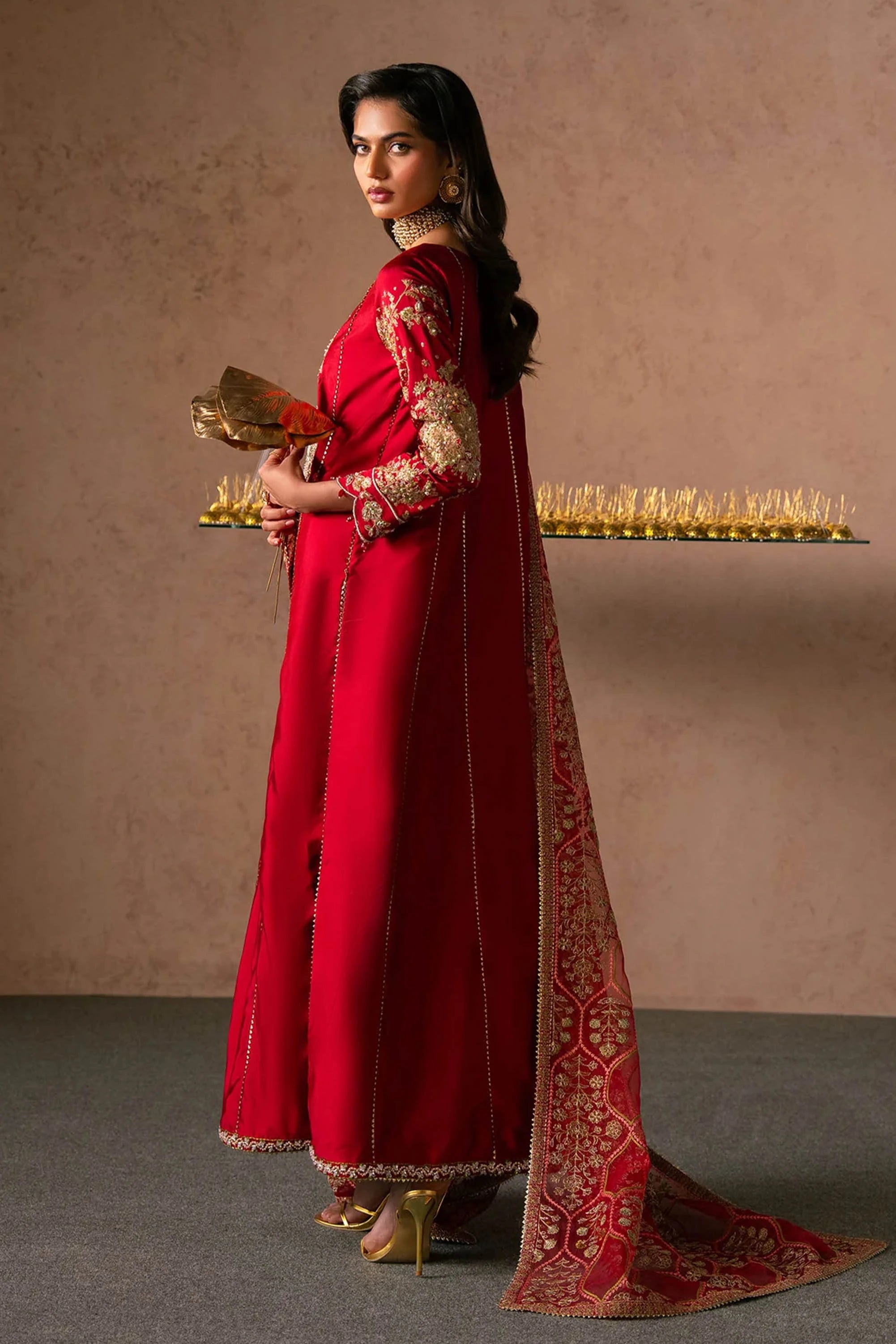 Buraqstore girl posing in red colour dress tissue silk with minimal chic styling