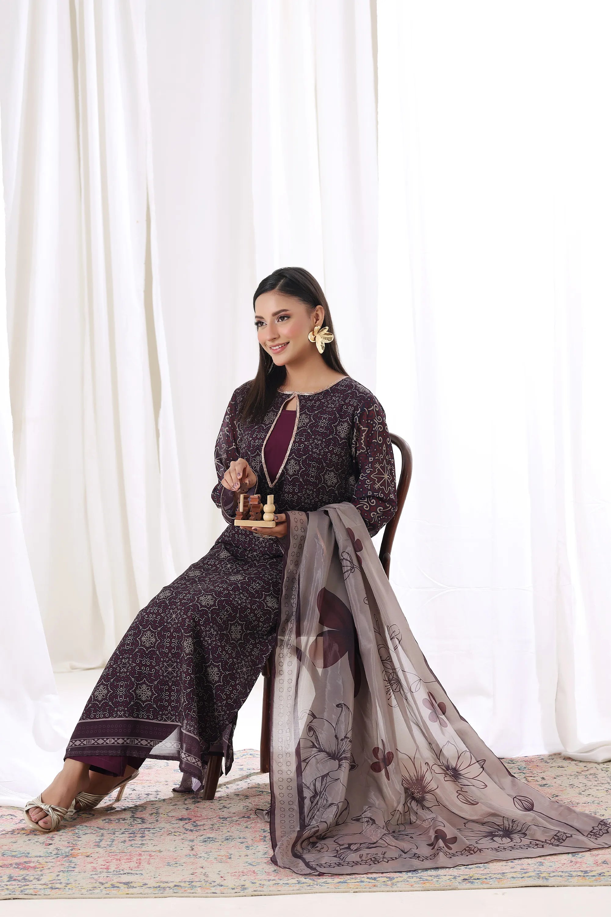 Female model showcasing Plum Noir chiffon pret Buraqstore, elegant ladies outfit