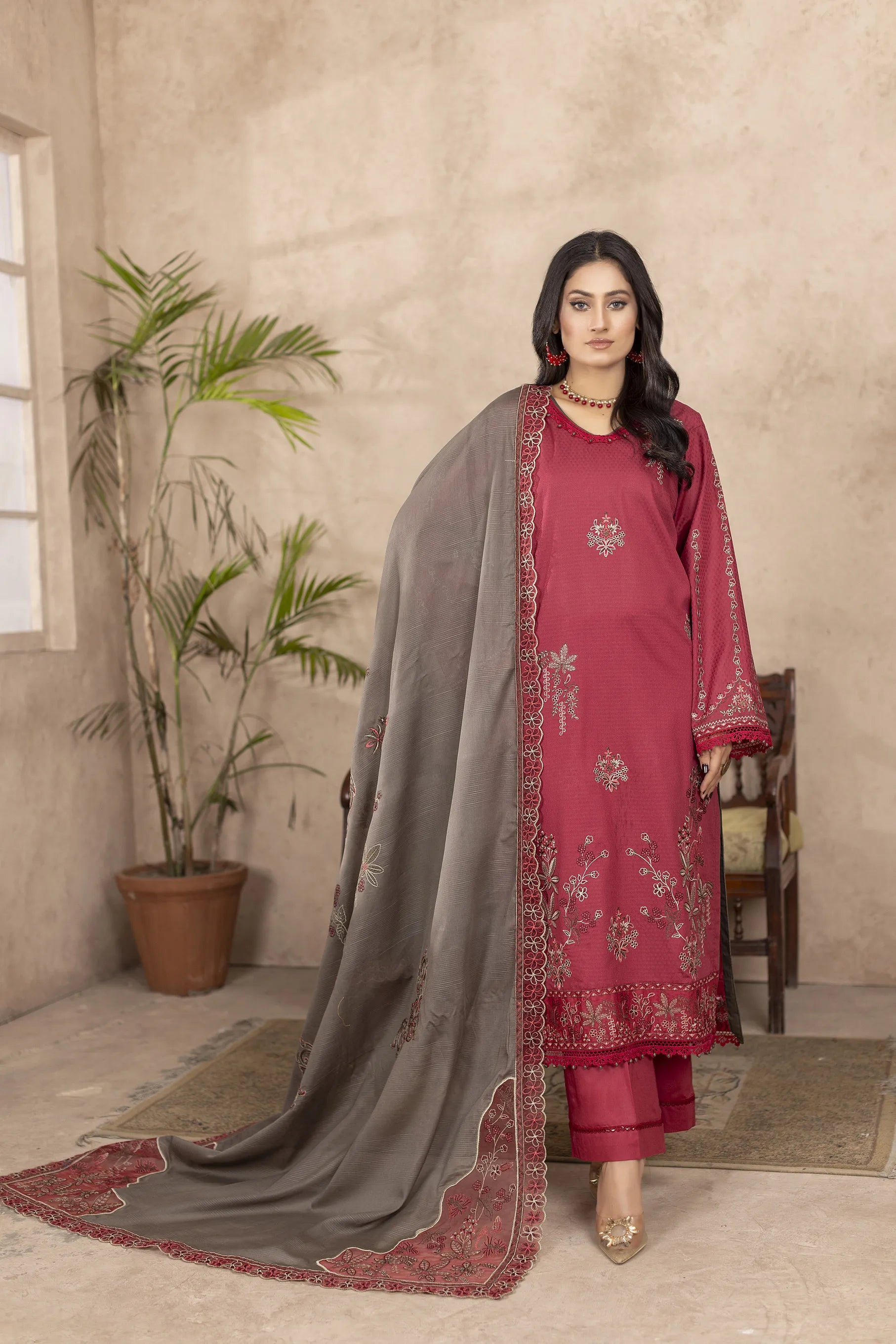 Girl wearing elegant maroon lawn dress design by buraqstore Pakistan