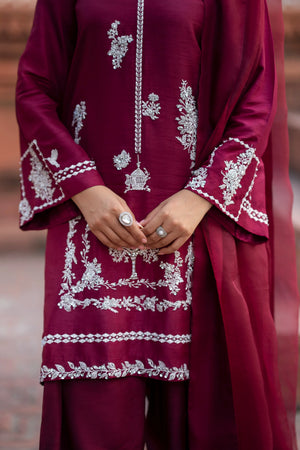 Girl wearing elegant maroon silk suit by buraqstore Pakistan