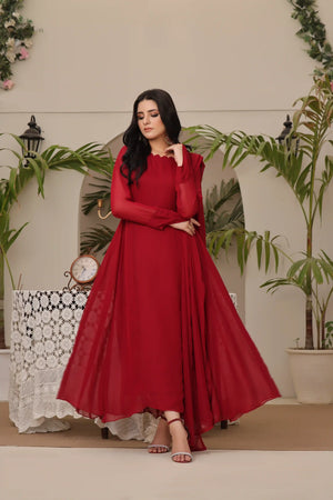 Buraqstore elegant girl twirling in flowy red colour dress chiffon showing fabric movement