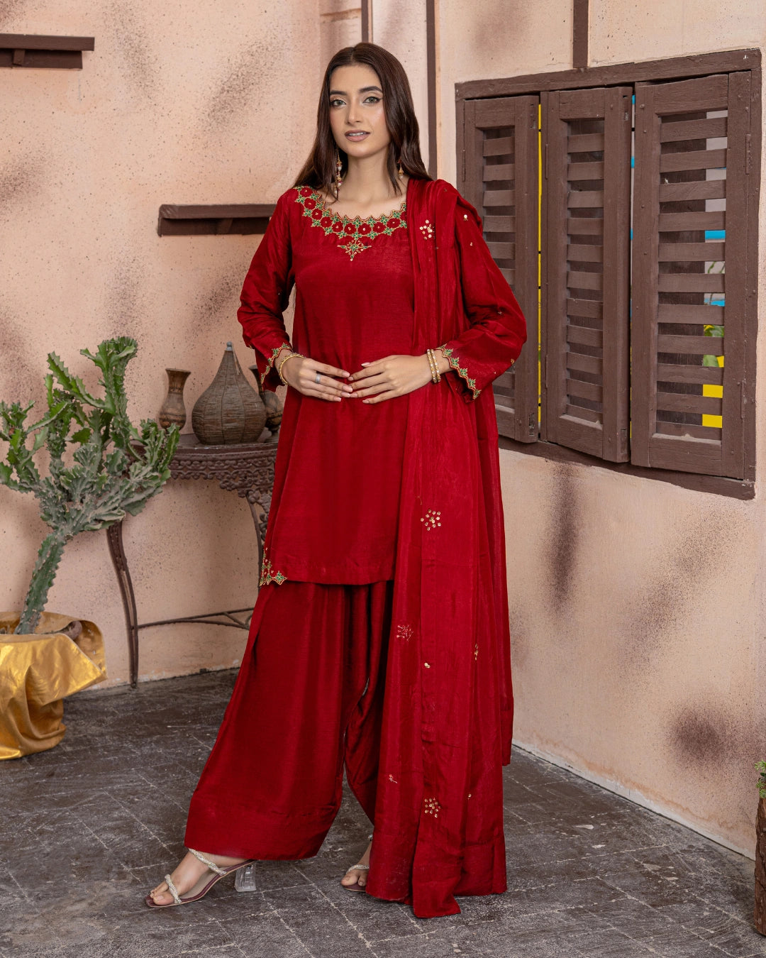 Girl wearing elegant maroon dress for girls by buraqstore Pakistan