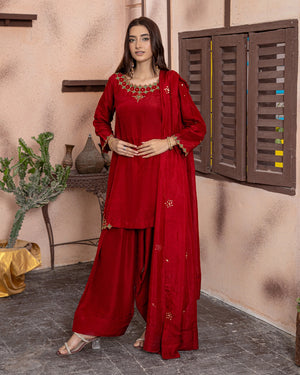 Girl wearing elegant maroon dress for girls by buraqstore Pakistan