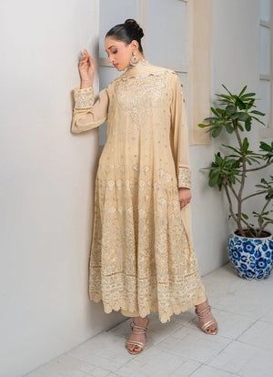 Women wearing beige color dress pakistani, chiffon dupatta draped over the shoulder, Buraqstore
