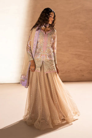 Model wearing beige net suit 3PC with handcrafted dabka embroidery, front view from Buraqstore