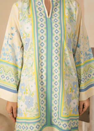 Model wearing beige summer lawn dress design, side view showing the fit of the printed poly lawn 2PC, Buraqstore