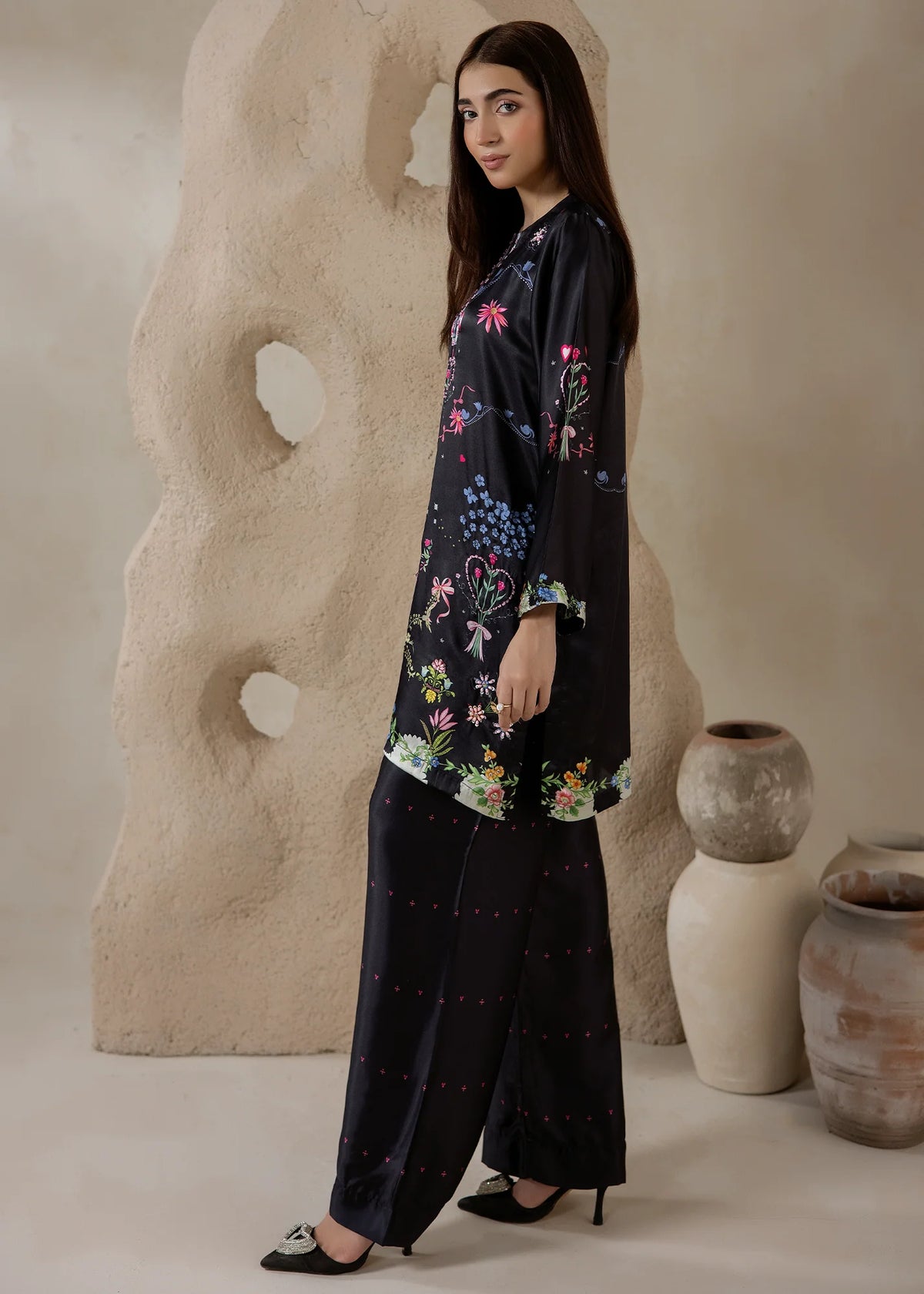 Women wearing black co ord set, close-up of the print on the charmeuse silk fabric, Buraqstore
