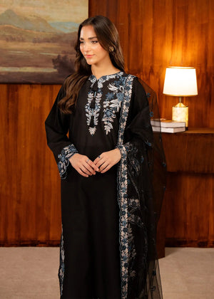 Model wearing black dress design, side view showing the fit of the lawn shirt and trouser, Buraqstore