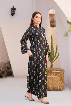 girl posing in Buraqstore floral lawn 2PC with black dress design and casual pret appeal