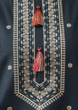 Model wearing blue dress design, side view showing the fit of the embroidered lawn 2PC, Buraqstore
