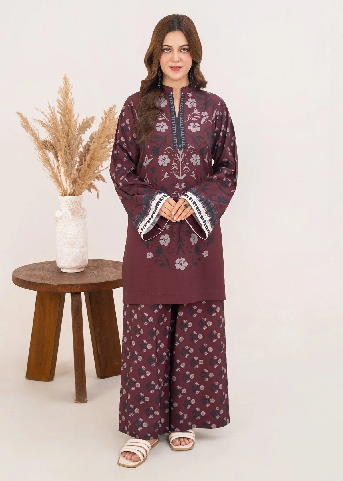Model wearing brown printed co ord set, 2-piece grip fabric set, front view from Buraqstore