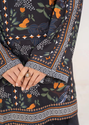 Women wearing black dress pakistan set, back view of the printed grip shirt and trouser, Buraqstore