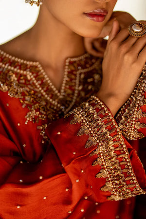 Women wearing deep rust kaftan dress price in pakistan set, side view of the relaxed sheesha silk fit at Buraqstore