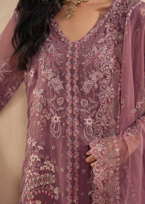 Women wearing purple dress design, organza dupatta draped over the shoulder, Buraqstore