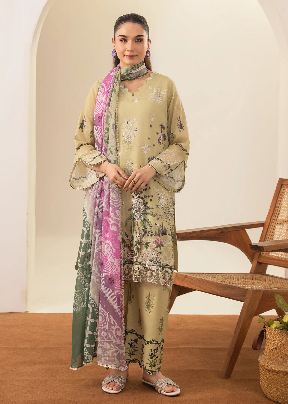 Woman wearing a Meerak embroidered Chikankari pret suit from Buraq Store