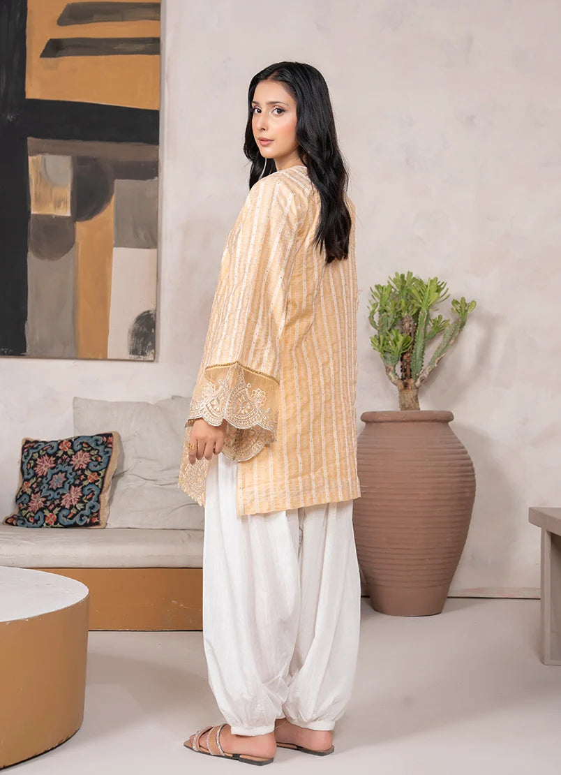 Women wearing golden color dress, close-up of the embroidery on the jacquard fabric texture, Buraqstore