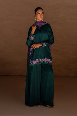 Model wearing green rayon silk suit 3PC with handcrafted floral embroidery, front view from Buraqstore