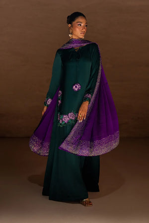 Women wearing green rayon silk suit, close-up of floral embroidery and rhinestone embellishment on the shirt, Buraqstore