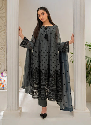 Model wearing grey colour dress design, side view showing the flow of the chiffon 3-piece set, Buraqstore