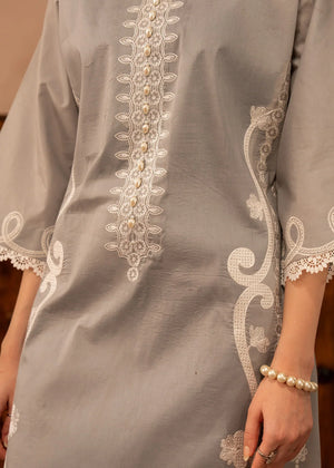 Women wearing simple lawn dress design, back view of the embroidered shirt and trouser, Buraqstore