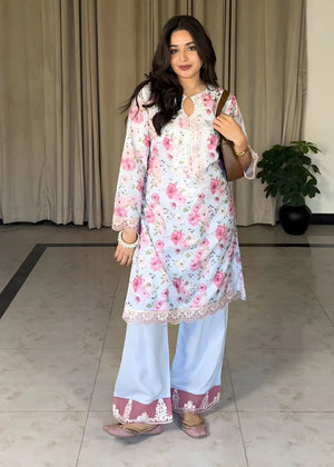 Model wearing ice blue dress, printed viscose 2PC set with lace and embroidery, front view from Buraqstore