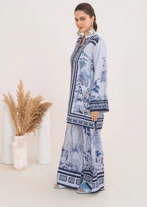 Women wearing ice blue color dress, close-up of the print on the poly lawn shirt, Buraqstore