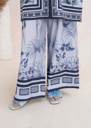 Model wearing ice blue color dress as a cool casual outfit, shop printed poly lawn 2PC set at Buraqstore