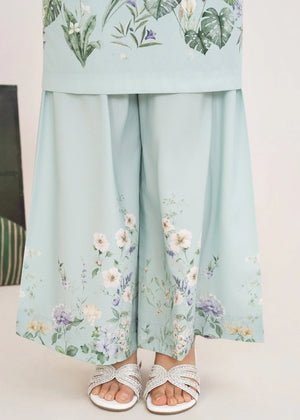 Model wearing ice blue summer co ord sets Pakistan, side view showing the fit of the printed poly lawn set, Buraqstore