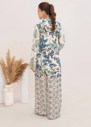 Women wearing light blue dress, close-up of the print on the grip fabric shirt, Buraqstore