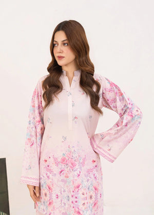 Model wearing pink color dress pakistani set, side view showing the fit of the printed poly lawn 2PC, Buraqstore