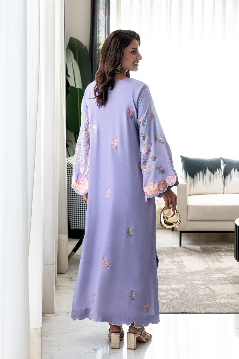 Girl wearing elegant purple kaftan dress for girls Pakistan by buraqstore