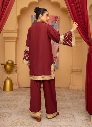 Women wearing maroon dress for women, close-up of the embroidery on the bana dora fabric, Buraqstore