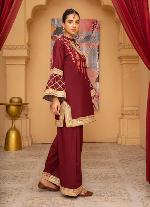 Model wearing maroon dress for women, side view showing the fit of the bana dora 2-piece set, Buraqstore