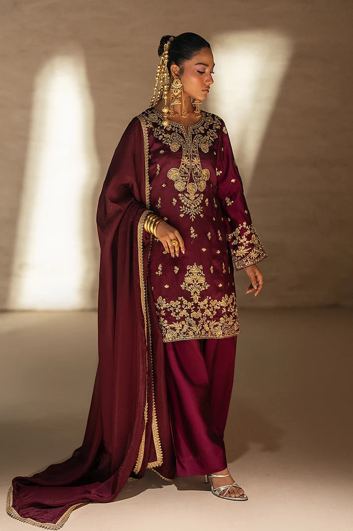 Model wearing maroon sheesha silk suit 3PC with handcrafted antique gold embroidery, front view from Buraqstore