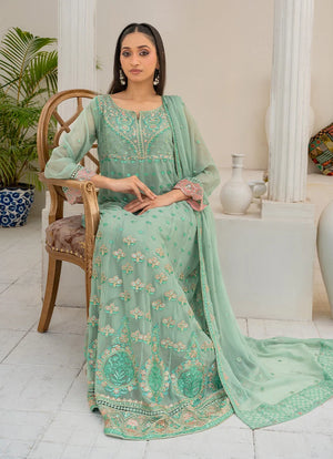 Model wearing light green color dress as a festive outfit, shop the embroidered chiffon 3-piece set at Buraqstore