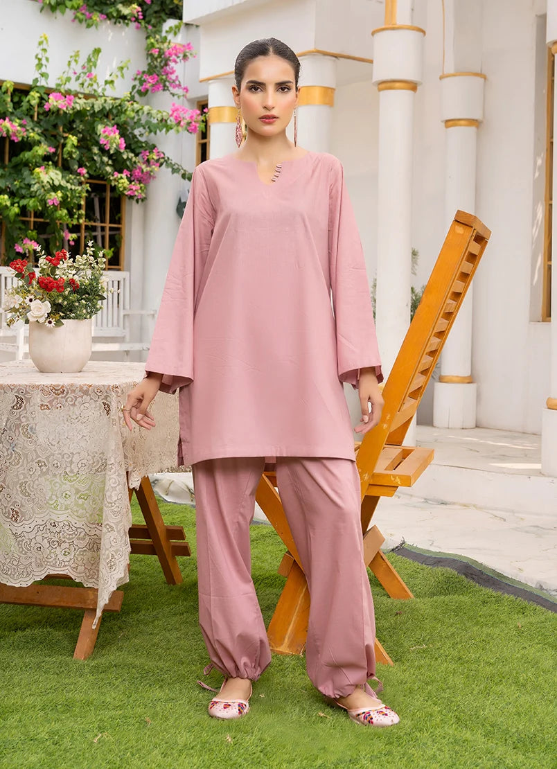 Model wearing mauve color dress in a muted tone, a cotton co-ord top and bottom, front view from Buraqstore