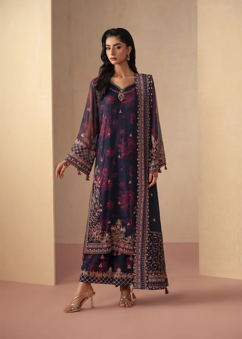 Model wearing navy blue dress pakistani, a printed, embroidered and embellished chiffon shirt and trouser, front view from Buraqstore