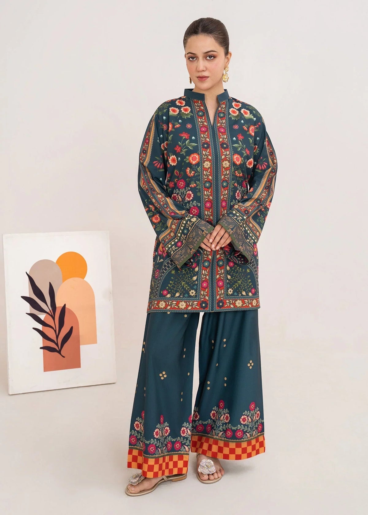 Model wearing navy blue color dress, printed grip 2PC set, front view from Buraqstore