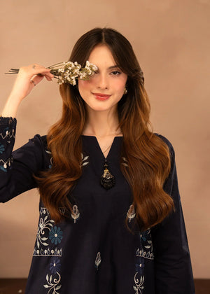 Women wearing navy blue dress pakistani, back view of the embroidered shirt and trouser, Buraqstore