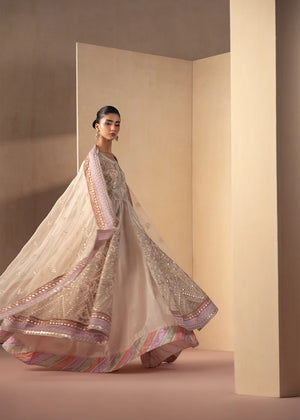 Model wearing off white dress, side view showing the flow of the maxi, Buraqstore